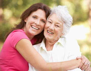 <img alt="mom with glaucoma and daughter hugging"
