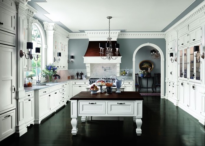 dark wood floors and blue walls give this white kitchen an extra pop dark wood floors and blue walls give this white kitchen an extra pop