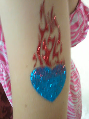 flaming heart glitter tattoo by sparklingexpressions