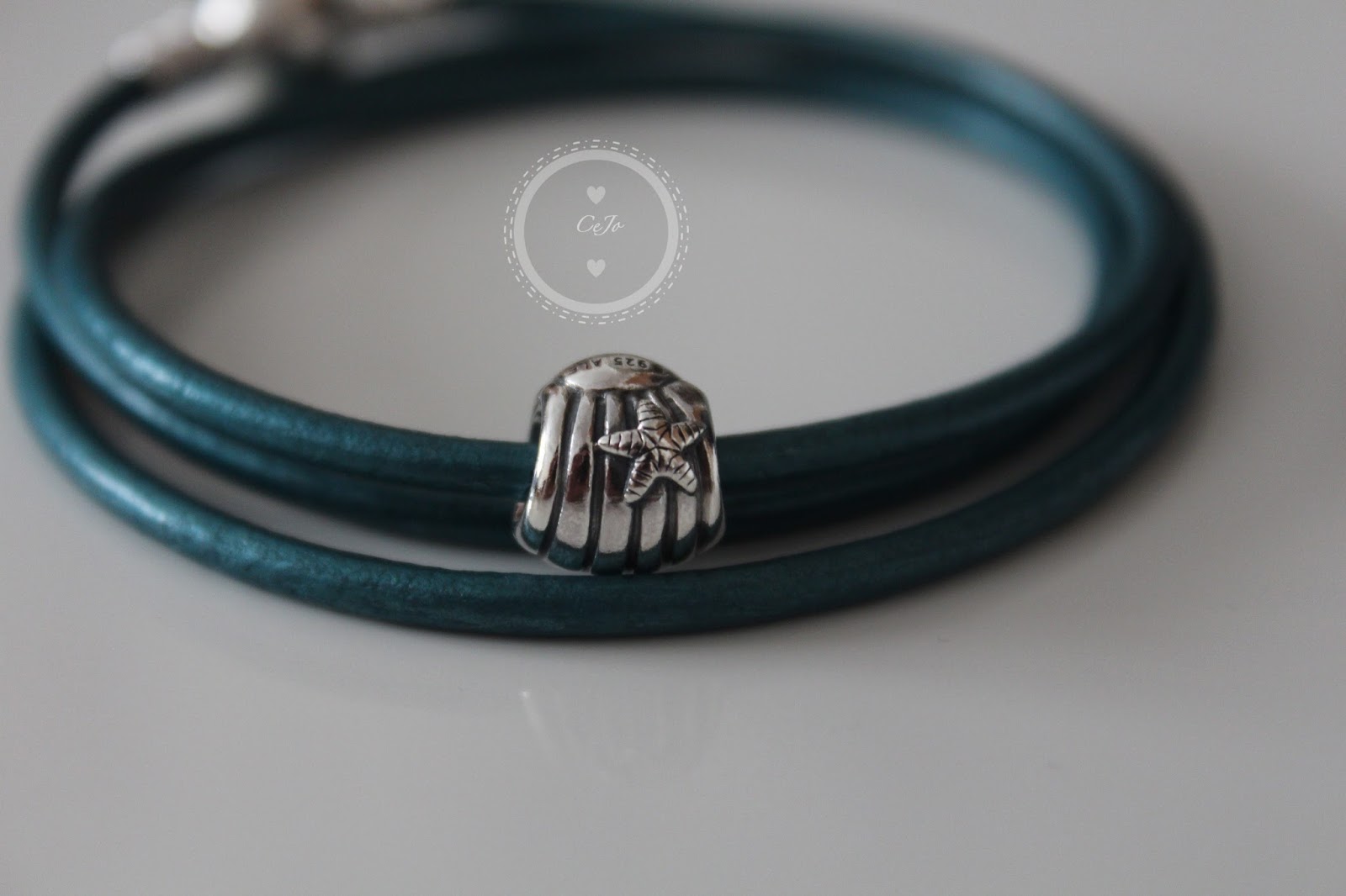 pandora teal leather bracelet with seashell charm