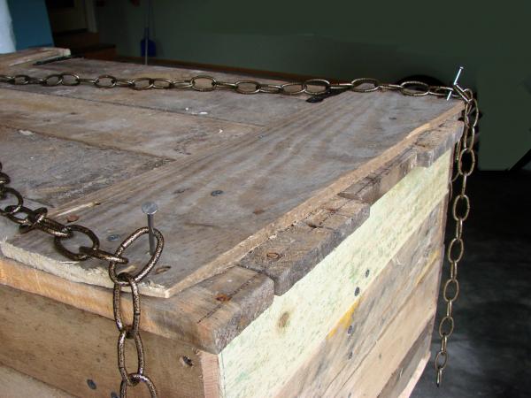 we put a giant lock where the chains cross and a bat plaque or coat of arms in the center of the coffin