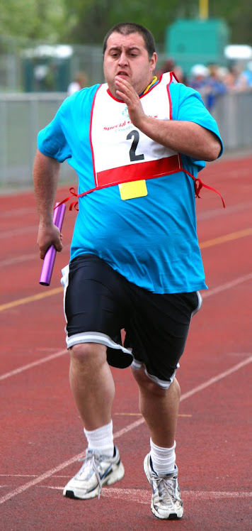 SPECIAL OLYMPICS ATHLETE HEADS FOR THE FINISH LINE!