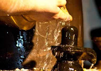 why devotee offering water to God shiva lingam ?