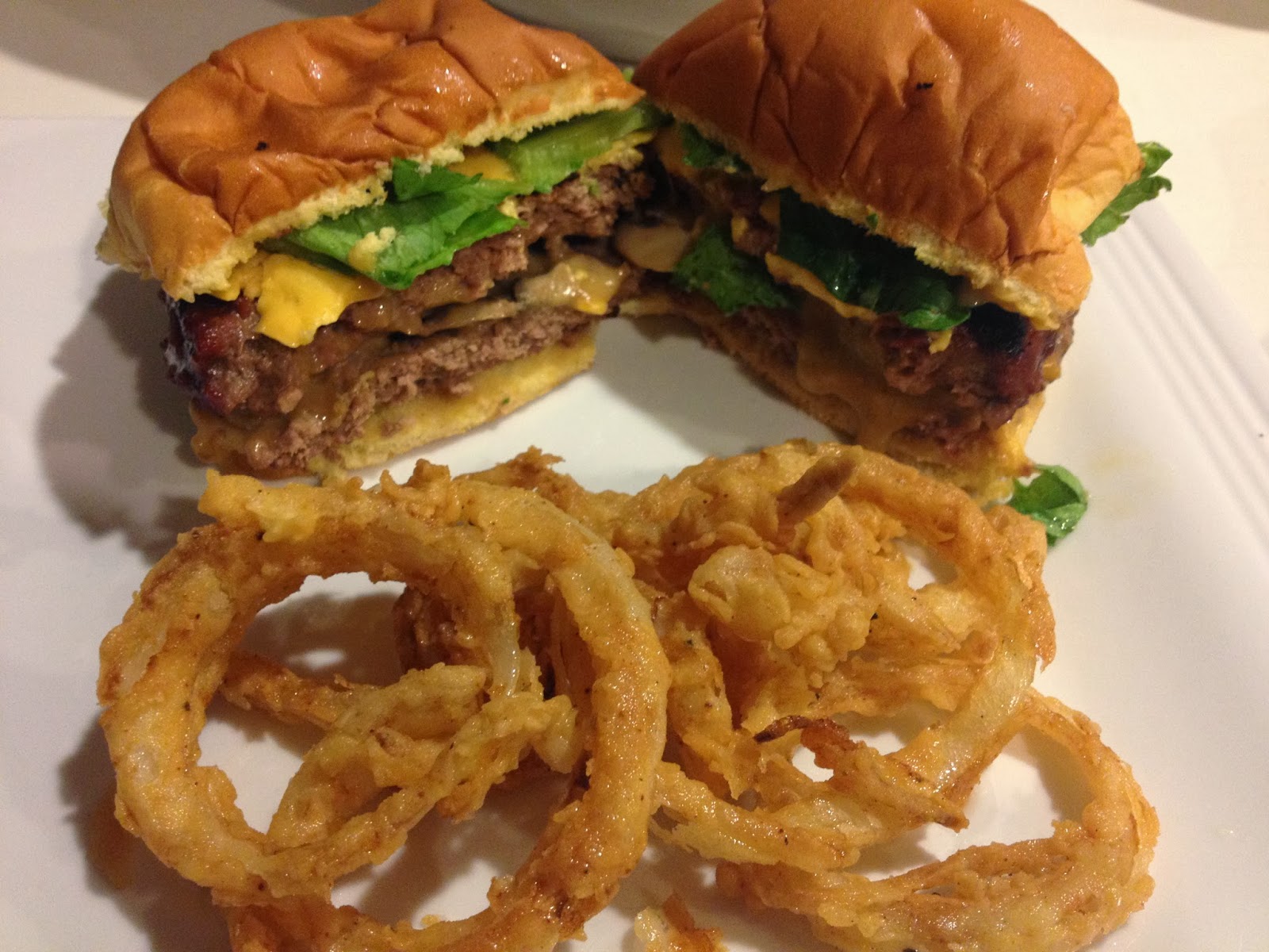 Kiss My Apron Stuffed Burgers and homemade Onion Rings