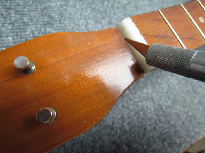 Removing the Old Nut and Saddle SilvertoneHarmony Baritone Ukulele
