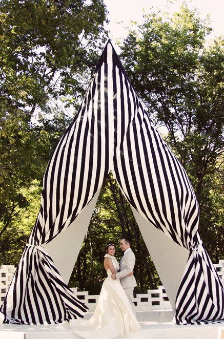 Go black and white in a big way at your wedding This tented area acts as