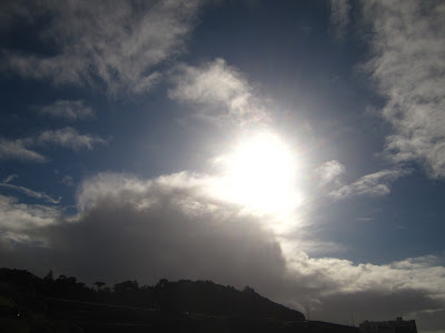 sun bursting through clouds