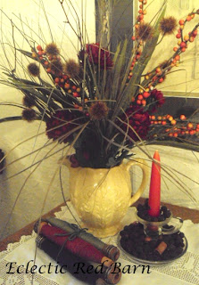 vintage yellow vase, fall flowers, vintage bobbins, candle