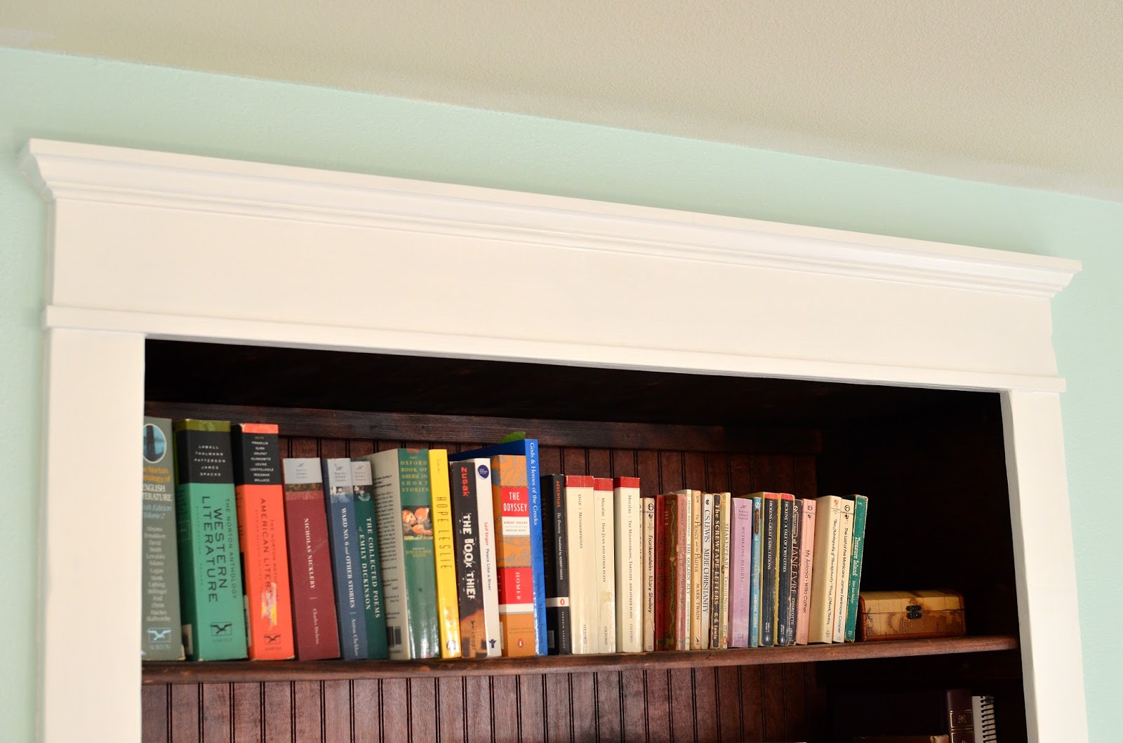 from holes to built in bookshelves trimming on the bookshelves