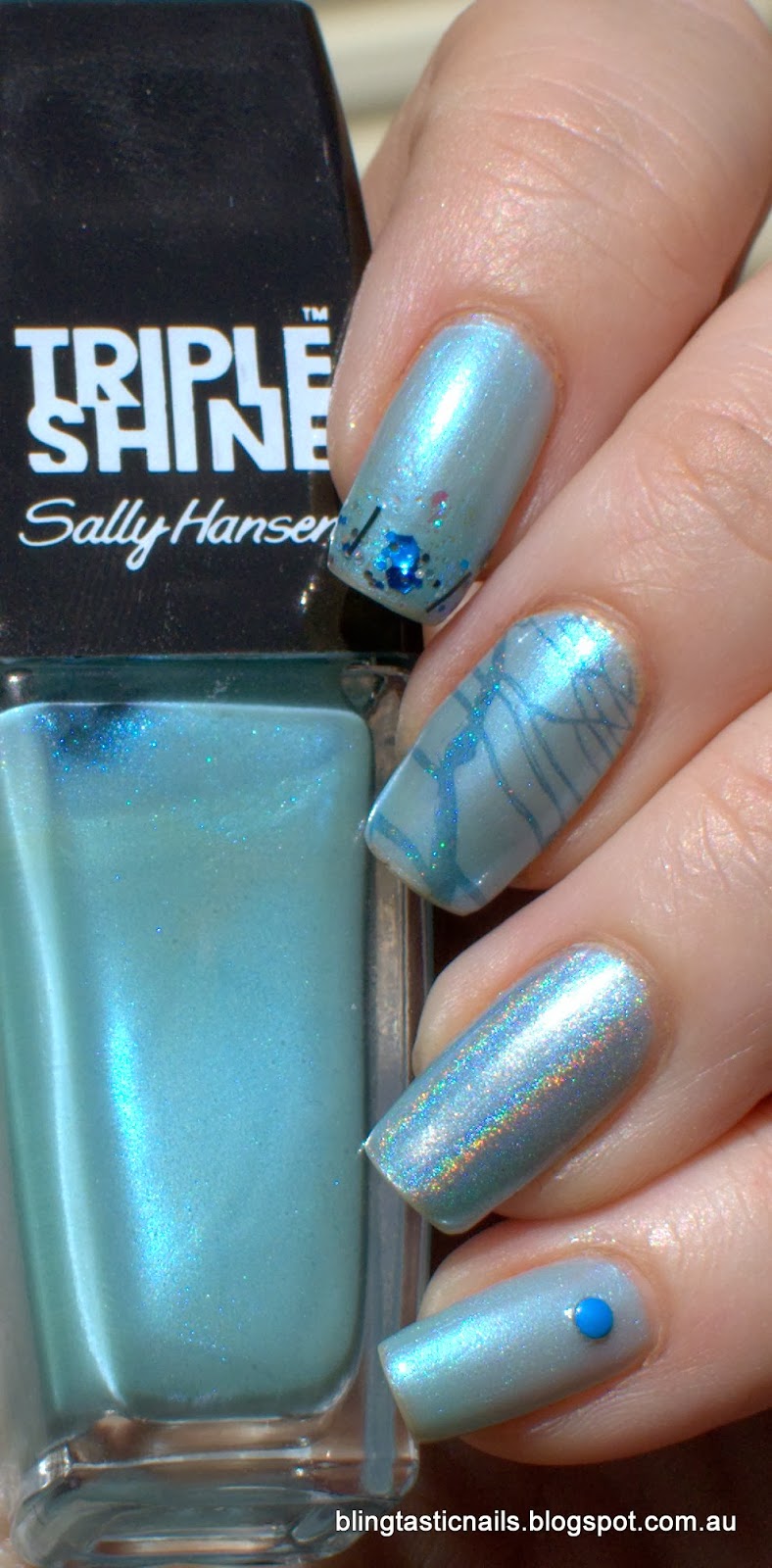 Sally Hansen Pool party with glitter gradient stamping and studs