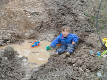 a boy and his mud puddle