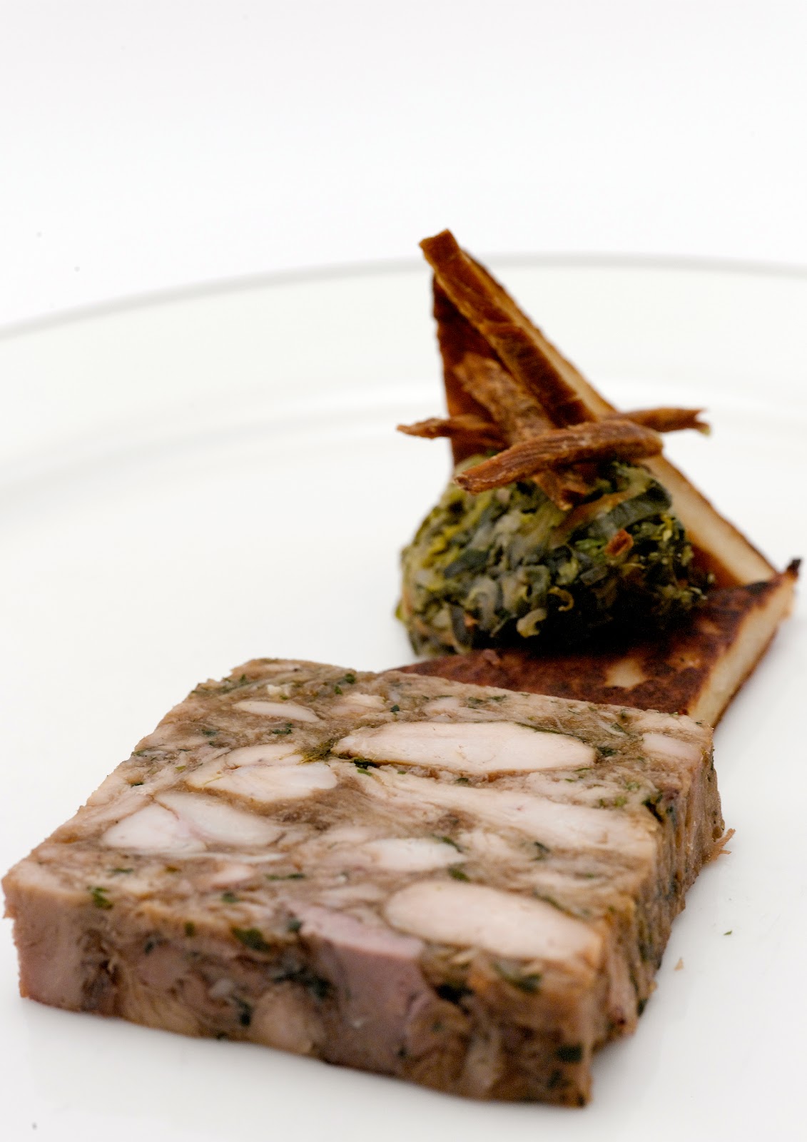 Kitchen Files Rabbit terrine with potato bread, cabbage and bacon