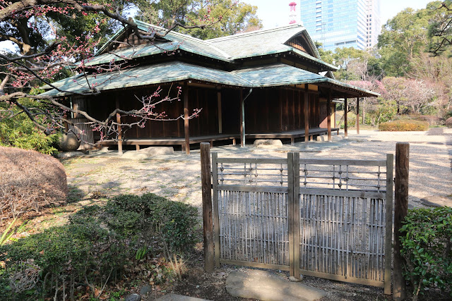 The oldest Suwa Tea Pavilion can be seen at the far end of the Japanese garden and pond at Imperial Palace East Garden in Tokyo, Japan The oldest Suwa Tea Pavilion can be seen at the far end of the Japanese garden and pond at Imperial Palace East Garden in Tokyo, Japan