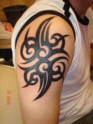 tribal tattoos for men on shoulder. maori-tribal-tattoos-shoulder-chest; tattoos for men on chest to shoulder.