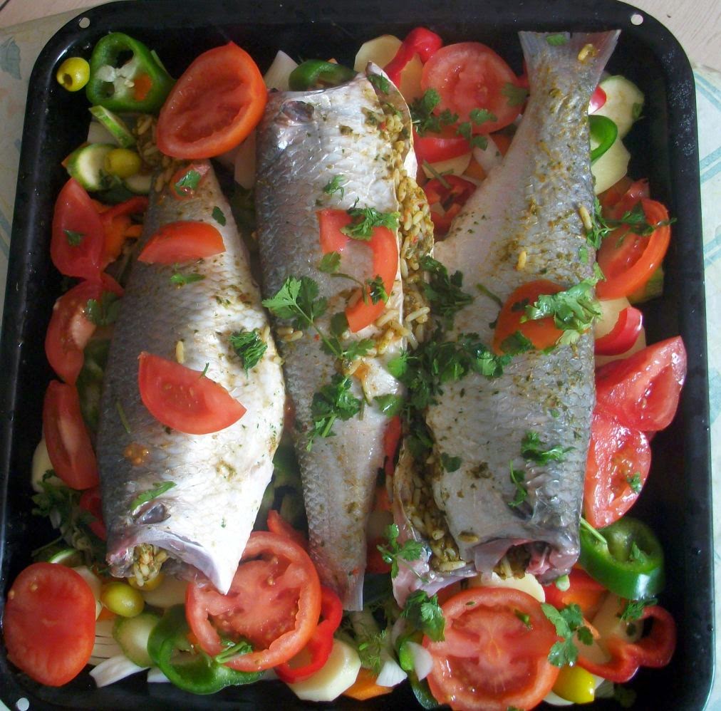 Moroccan baked stuffed fish with vegetables Fleur d'oranger, Masala