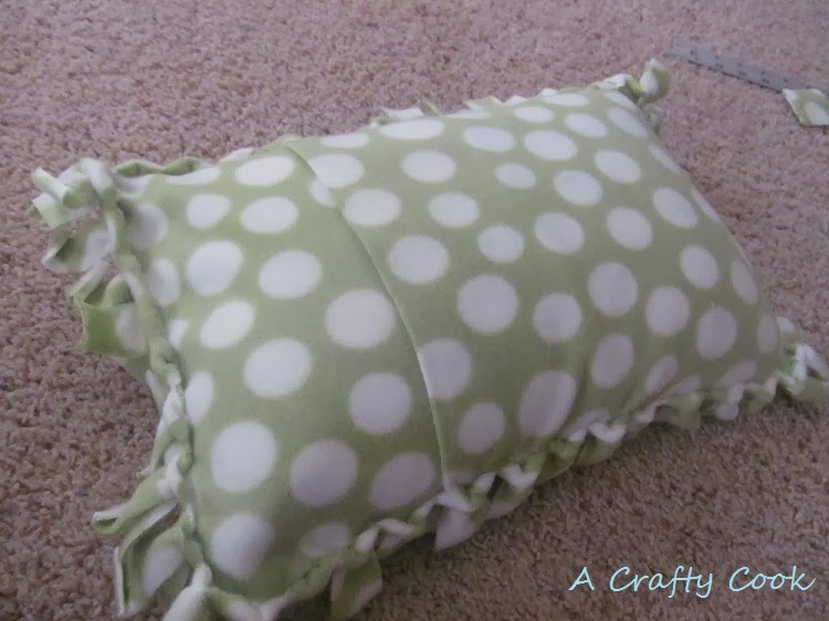 A Crafty Cook No Sew, No Knot Fringe Fleece Blanket and Pillow Cover