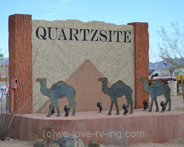 Name sign with camels to signify the history of this town