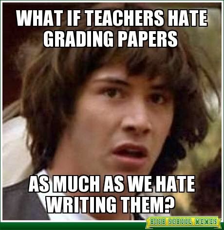 Teacher grading papers meme image
