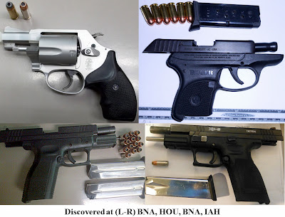 Four loaded handguns. Four loaded handguns.