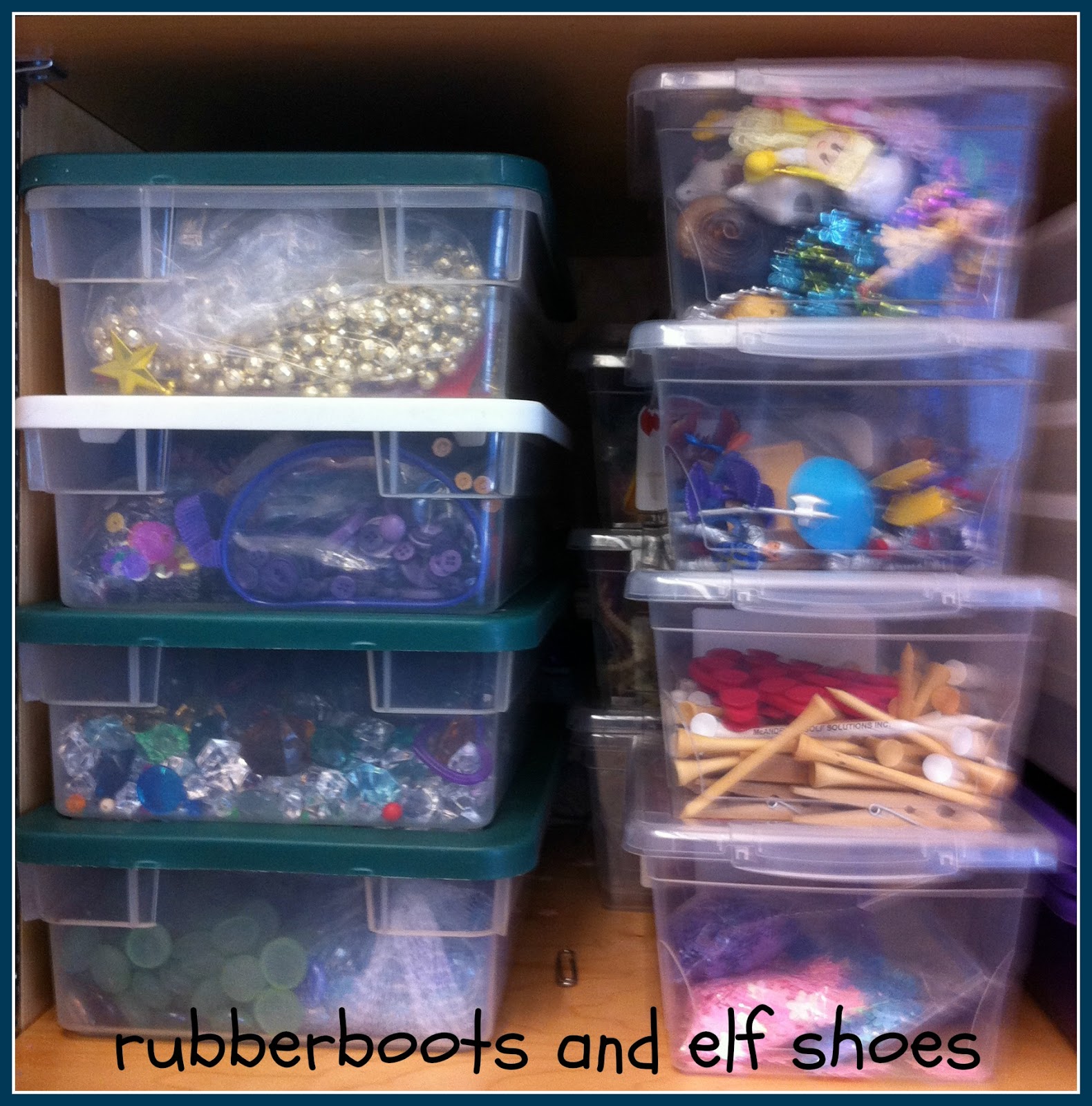 organizing sensory bin "stuff" rubber boots and elf shoes