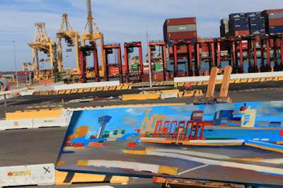 plein air oil painting by artist Jane Bennett of the last non automated straddle cranes operating at Patrick Terminal Port Botany