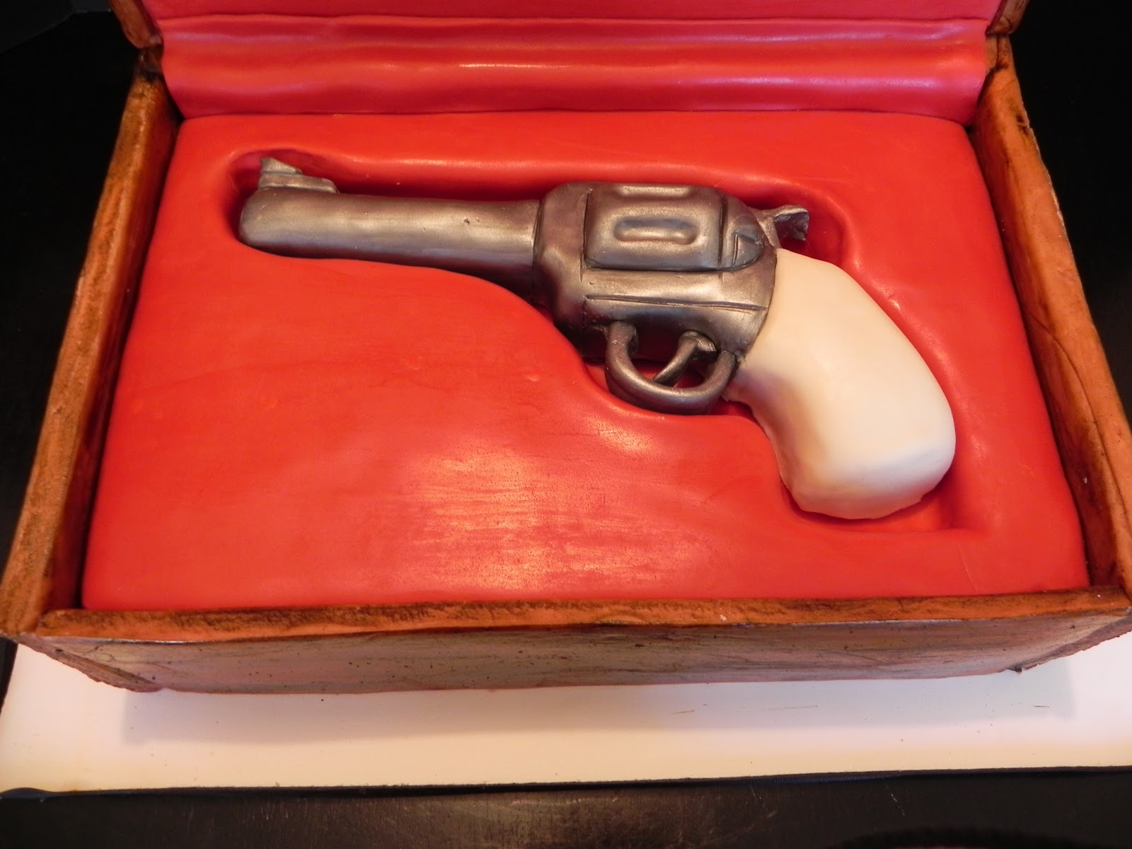 {this & that} cake shop The Gun Cake