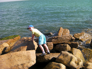 climbing sea defence rocks exposed at low tide where the dismembered torso washed up on southsea beach
