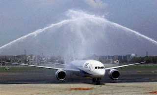 a jet plane spraying water