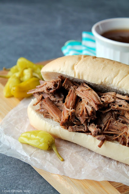 Slow Cooker Italian Beef Sandwiches - this easy slow cooker meal is full of beefy flavor and the perfect football food!