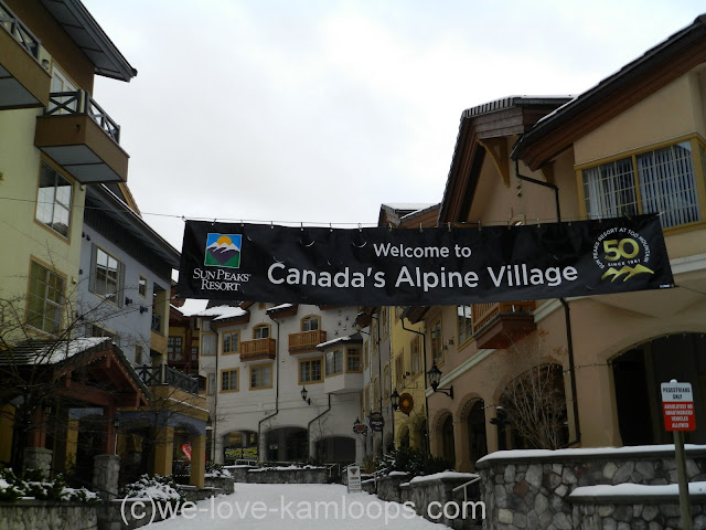 Stores and condos line the streets of the village