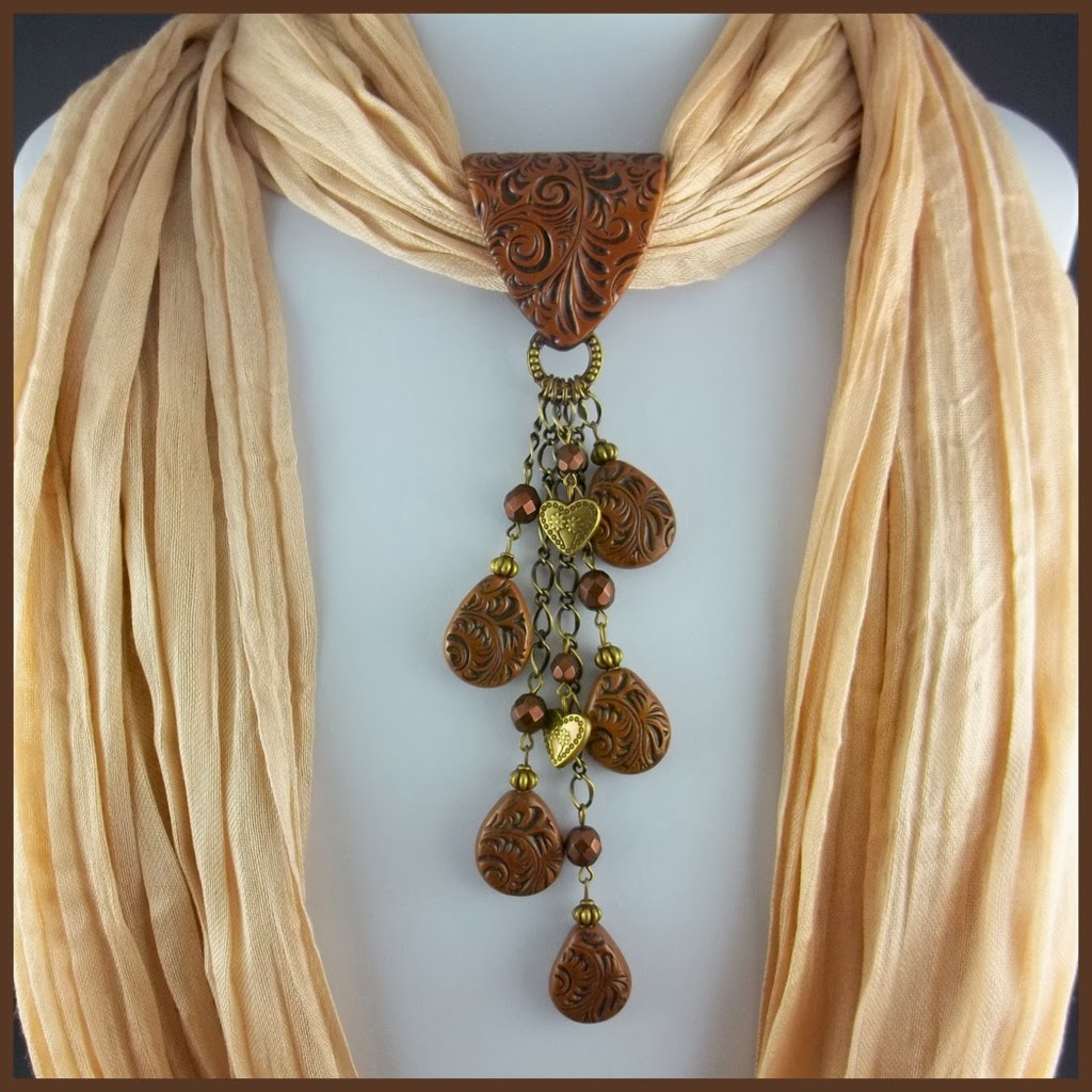 2 Good Claymates Tooled Leather Jewelry