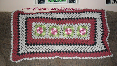 Tapete de crochê com flores