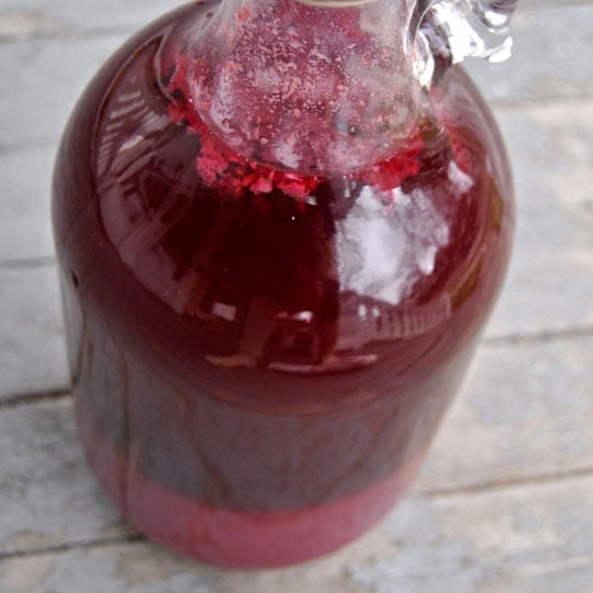 Concord Grape Wine with a Weston Tomato Strainer