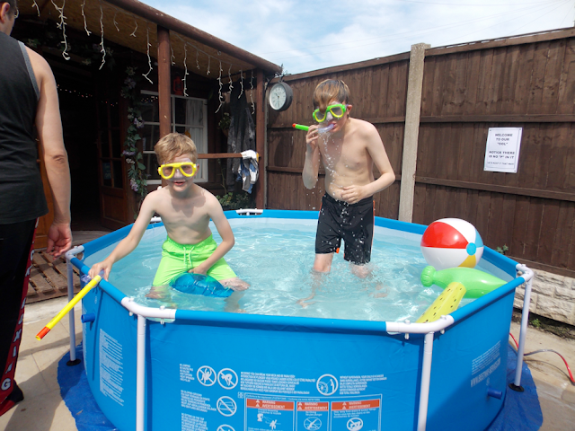 boys playing in pool 