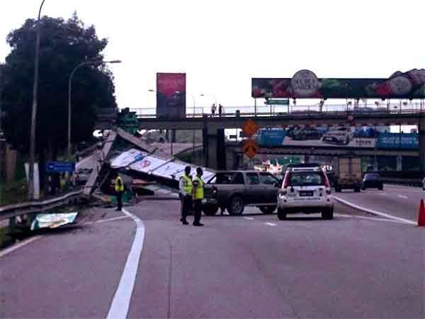 Papan tanda tunjuk arah terjatuh Cetus panik Pengguna PORTAL BERITA SATUSABAH