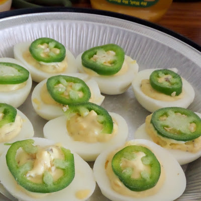 Jalapeno Deviled Eggs:  Hard-boiled eggs, split, and the whites filled with a spicy jalapeno yolk mixture.