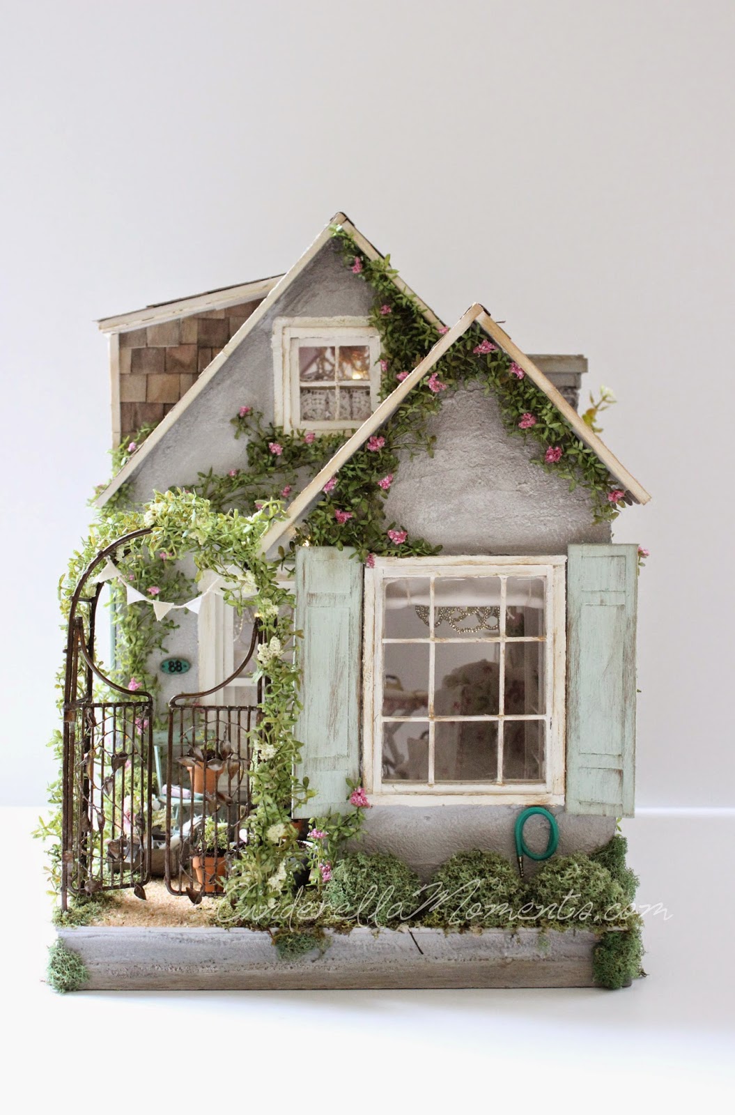 this is a minature house but i like it as inspiration for a gingerbread house mini doll house doll house glitter houses