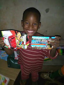 David Showing Off Gifts Recieved From Our Dear Sponsor Erica Of Netherlands. God Bless You Erica.