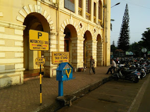 "Motorcycle & Taxi" stand in Margao.
