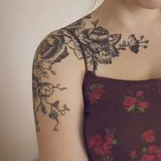 Girl sleeve flower tattoo on shoulder
