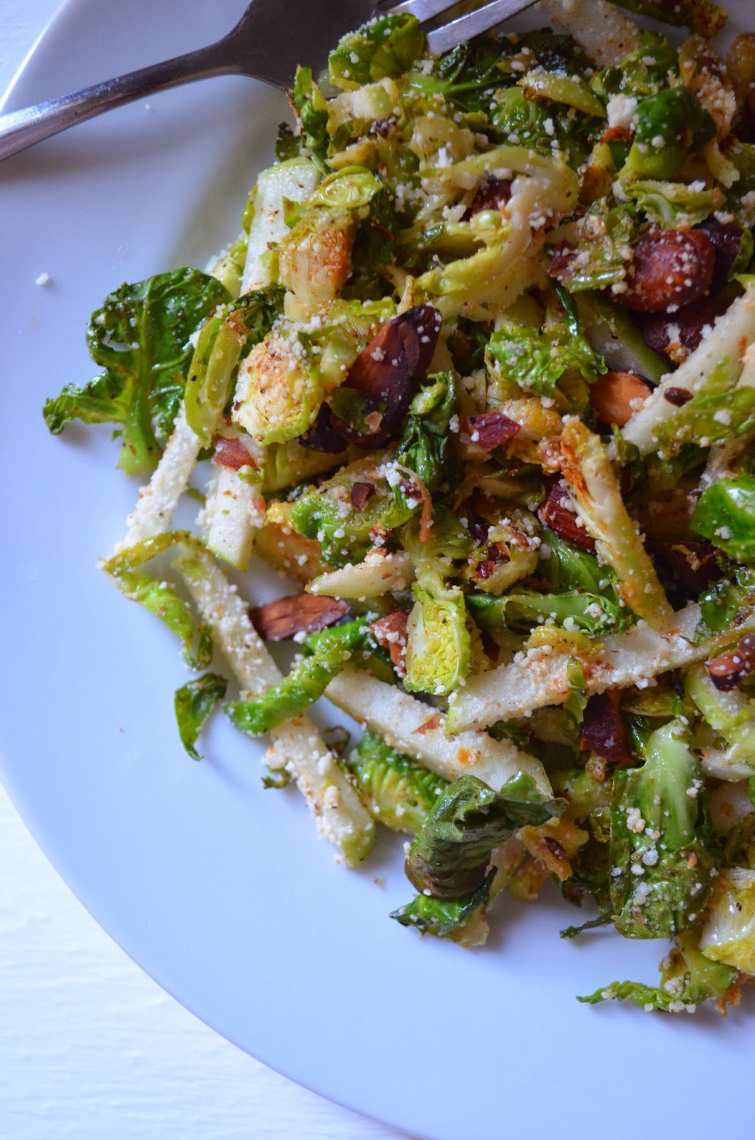 amour fou(d) brusselsprout salad with pecorino, toasted almonds, and