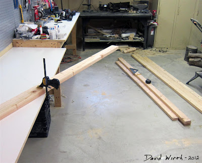 how to cut a 2x4, wood clamp, saw, measure, square, measuring tape how to cut a 2x4, wood clamp, saw, measure, square, measuring tape