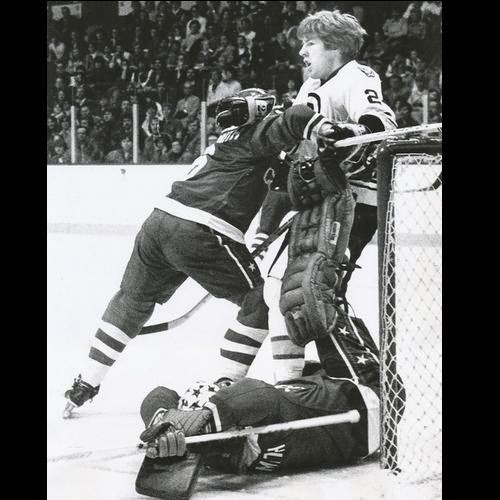 It only looks like... goalie Gary Smith is trying to perform a skate-blade appendectomy on Terry O'Reilly - oh wait, he is