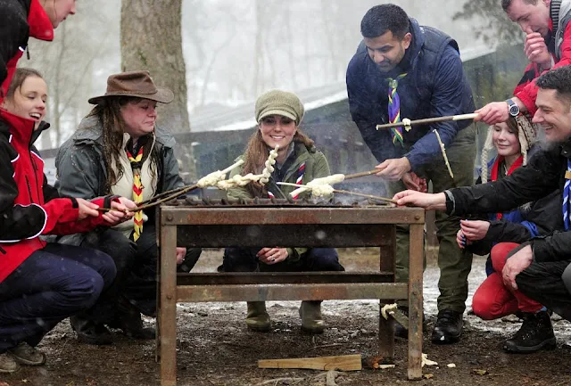 On the 22 March, the brunette beauty wrapped up in a parka, a tweed cap and a neckerchief for a chilly visit to the Lake District scout camp. Kate was in good spirits as she cooked some unleavened "twister" bread for the group. "Oh it’s actually not that bad – if you were desperately hungry," she quipped 