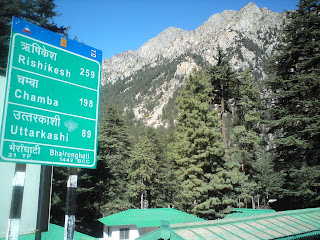 A board showing important road distances from Bhaironghati in the Garhwal Himalyas