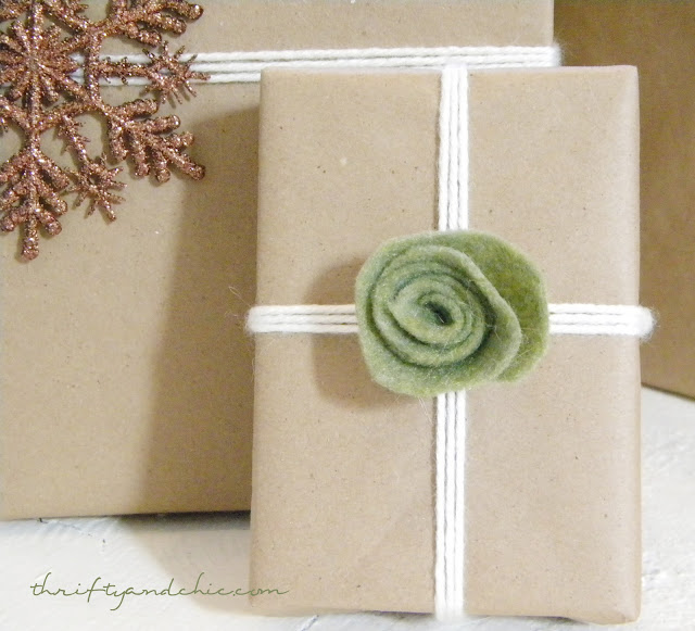 neutrally wrapped presents with kraft paper and yarn