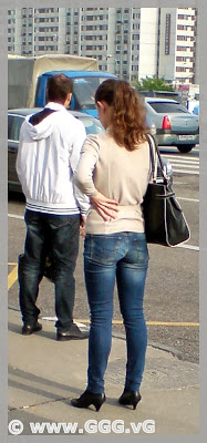 Girl in jeans on the bus station