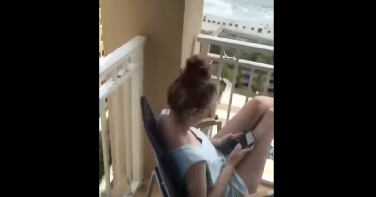 Smoking balcony flashing legs tits