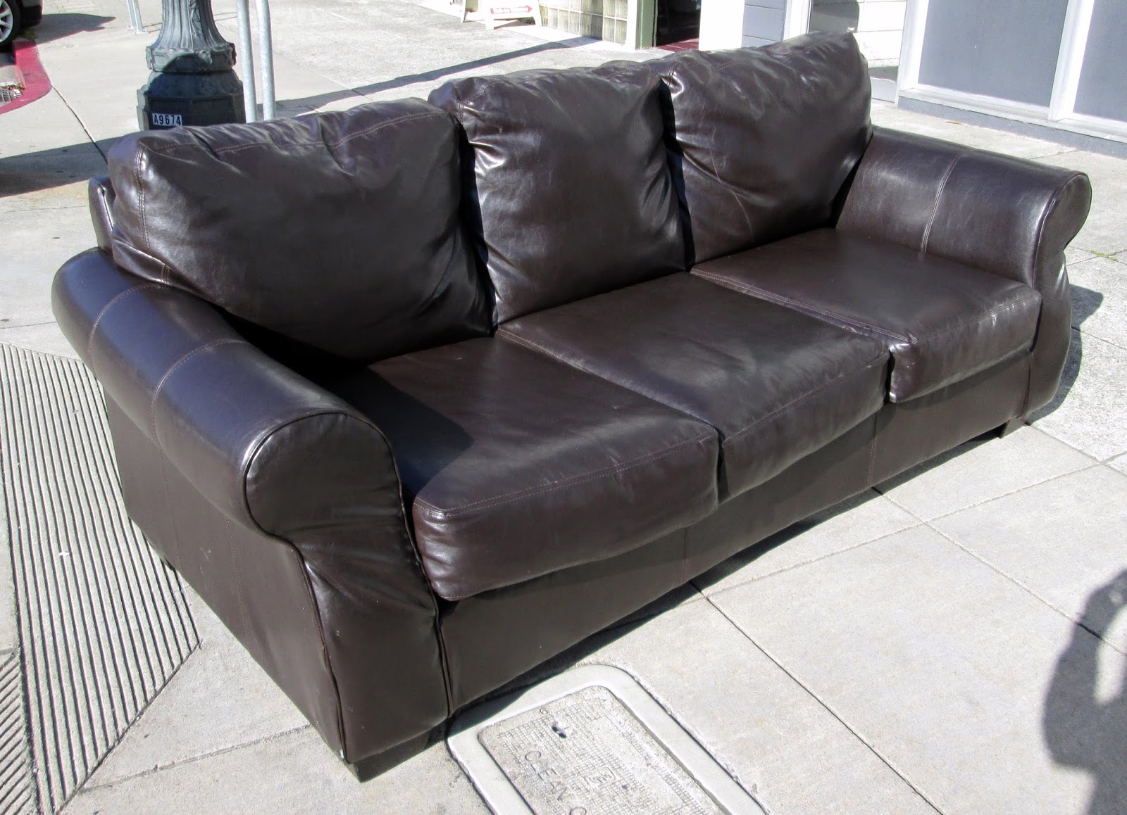 UHURU FURNITURE & COLLECTIBLES SOLD Dark Brown Faux Leather Sofa 240