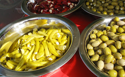 Pickles and olives on a stall at the food festival
